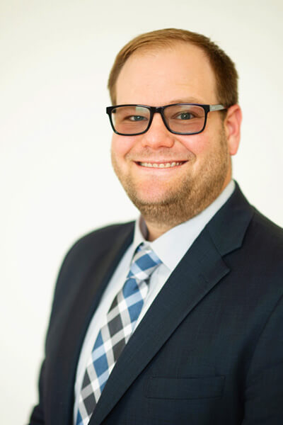 Corey A. Baures — Senior Paralegal